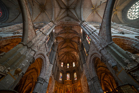 Captivating Interior of Avila Cathedral with Historic Archesの写真素材