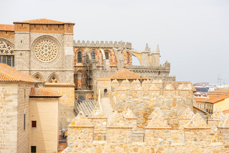 Ãvila Cathedral Rising Above Iconic Medieval City Wallsの写真素材