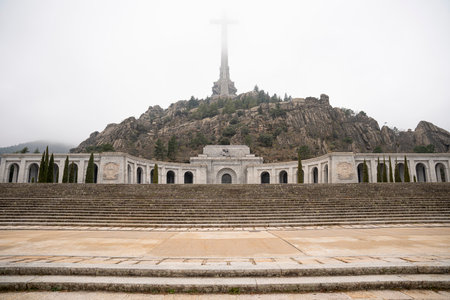 Iconic Cross at Valley of the Fallen, Enveloped by Fogの写真素材