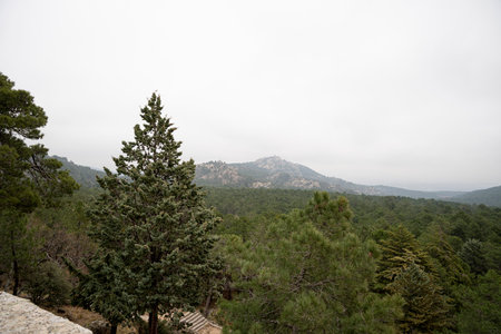 View of Guadarrama Mountains from the Valley of the Fallen in Spainの写真素材