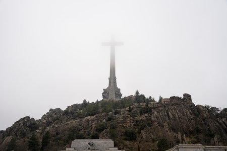 Ethereal Fog Surrounds the Monumental Cross at Valle de los CaÃ­dosの写真素材