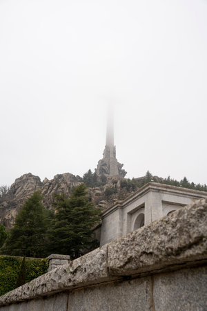 Misty Day View of the Valley of the Fallen's Monumental Crossの写真素材