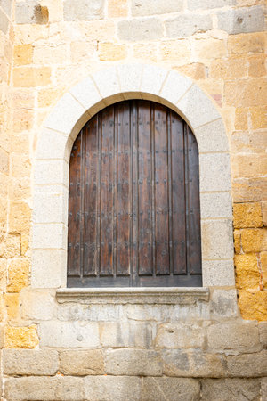 Captivating Close-up of Ãvila Cathedral's Stone Architectureの写真素材