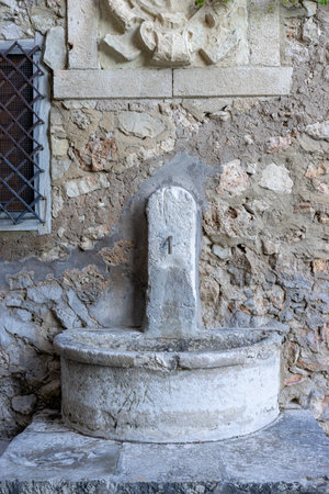 Elegant Stone Fountain in Cuenca, Spain's Historic City Centerの写真素材