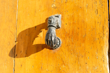 Ancient Door Handle - Iron Key and Knocker Detailの写真素材