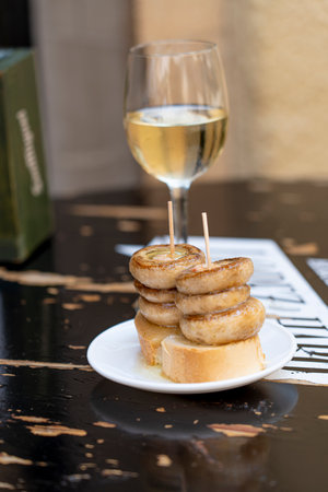 Garlic Mushrooms on Bread with White Wine in LogroÃ±o Tapas Sceneの写真素材