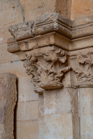Intricate stonework adorns the column capital at Colegiata de Santa Maria la Mayor de Toro,...