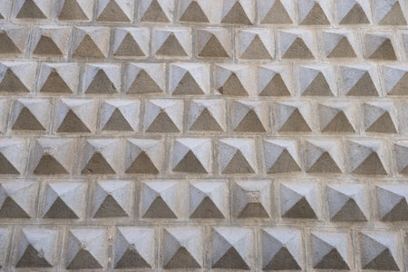 Textured Wall with Pyramid Shapes in Segovia, Spainの写真素材
