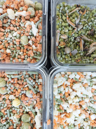 Colorful mixture of small food ingredients in containers., orangeの写真素材