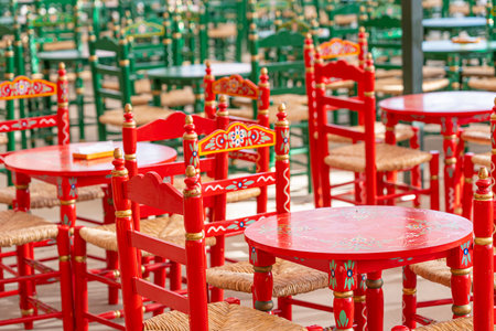 Colorful red and green chairs and tables.. MÃ¡laga, Spain, outdoorの写真素材
