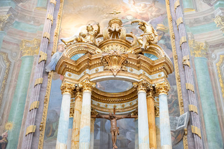 Ornate altar with golden decorations and religious figures.. City of Toledo, Spain, columnsの写真素材