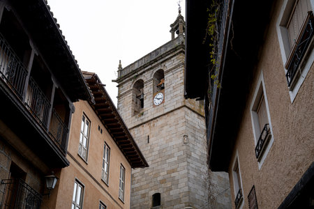 Narrow streets with historic buildings and a clock tower.. streets of the municipality of La...