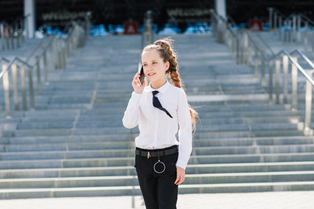 Female child boxer in gloves, feminism concept. Back to school, physical training.