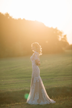 Young beautiful woman in blooming garden.の写真素材