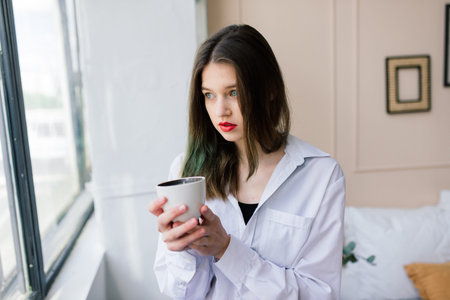 Lonely sad woman deep in thoughts at home, depression