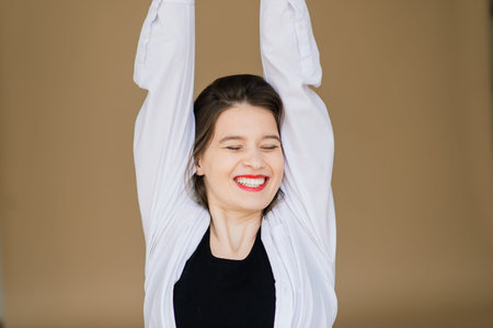 Emotional portrait of surprised woman. Amazement emotion. Studio isolated shot.