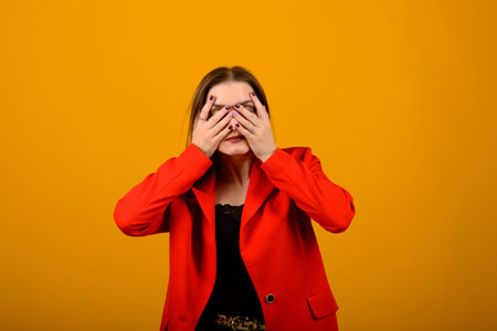 Human emotions, feelings, attitude and reaction. Picture of fashionable female with sincere joyful smile and charming eyes enjoying free time at home after lectures at university.の写真素材