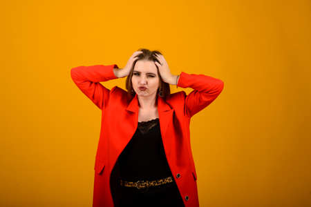 Human emotions, feelings, attitude and reaction. Picture of fashionable female with sincere joyful smile and charming eyes enjoying free time at home after lectures at university.の写真素材