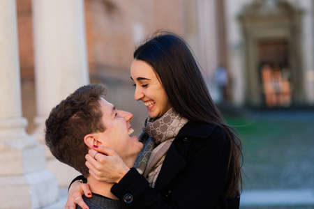 Bologne, Italy - 02.05.2020. Young fashion couple walking down the street in summer in europe.のeditorial素材