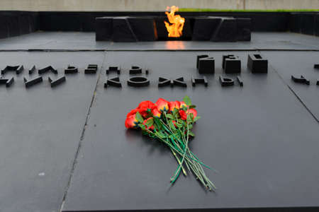 Khatyn, Belarus - 05.02.2020: The bells in Khatyn with sky background. The cemetery of burned vilages.のeditorial素材