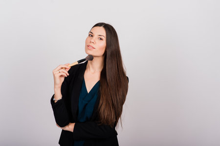 Cosmetologist beautician holding a tool in her hands, permanent makeup master, permanent makeup,...