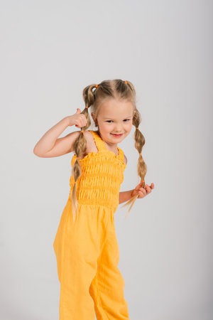 Portrait of beautiful and confident girl isolated on whiteの写真素材