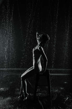 Young sexy woman in white lingerie. Water studio photo, world water dayの写真素材