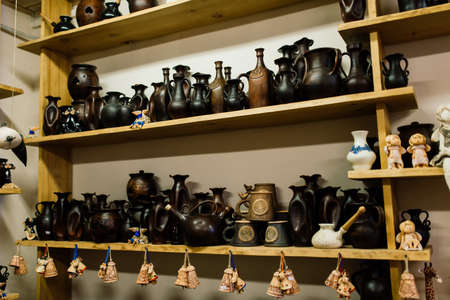 Minsk, Belarus - 01.23.2021. Handmade pottery jug. Raw handicraft clay brown tableware, earthenware jug before firing in pottery workshop. Ceramics product concept.のeditorial素材