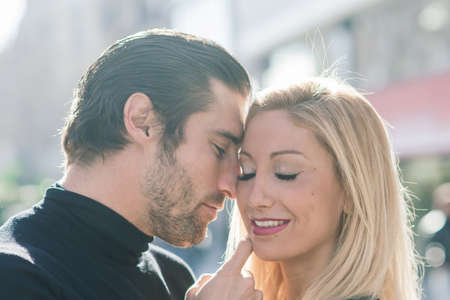 Barcelona, Spain - 02.04.2020. Beautiful young female enjoying nature on field of sunflowers at sunsetのeditorial素材