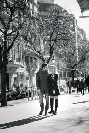 Barcelona, Spain - 02.04.2020. Beautiful young female enjoying nature on field of sunflowers at sunsetのeditorial素材