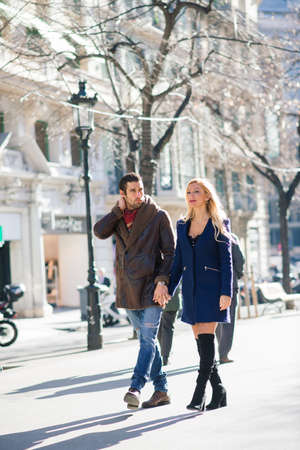 Barcelona, Spain - 02.04.2020. Beautiful young female enjoying nature on field of sunflowers at sunsetのeditorial素材