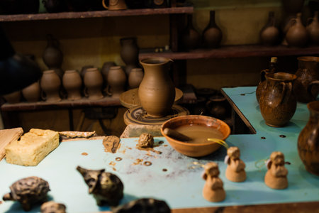 Minsk, Belarus - 01.23.2021. Handmade pottery jug. Raw handicraft clay brown tableware, earthenware jug before firing in pottery workshop. Ceramics product concept.のeditorial素材