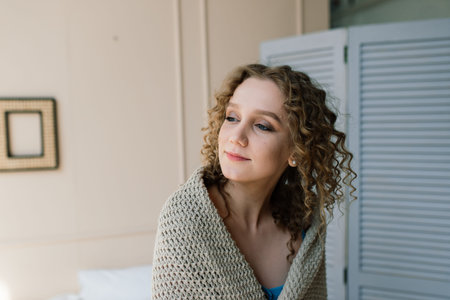 Lonely sad woman deep in thoughts at home, depressionの写真素材