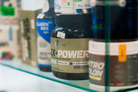 Minsk, Belarus - 03.07.2021. Diversity of food supplements in sport nutrition store, protein, fitnessのeditorial素材