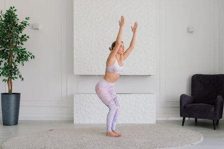 Young woman meditating, doing yoga at home, back, front and side view