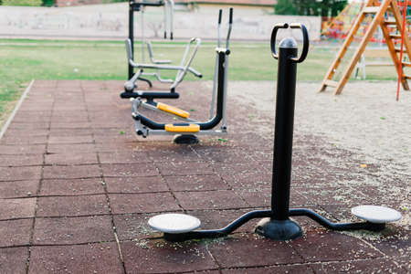 Exercise tools in a public park. Family and relax time on holiday concept.の写真素材