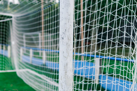 Training soccer field with a green turf. Football field with goals and markings or side lines