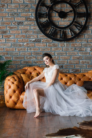 Bratislava, Slovakia - 05.13.2021. Art boudoir fashion photo of beautiful gorgeous woman in lingerie. Perfect body, wedding style.のeditorial素材