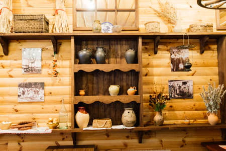 Bratislava, Slovakia - 02.24.2021. Ancient interior of a rural house in ethnographic park. Old stoveのeditorial素材