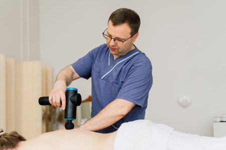 Anti-cellulite foot massage for fat woman. Concept of personal care, weight loss, diet. Close-up.の写真素材