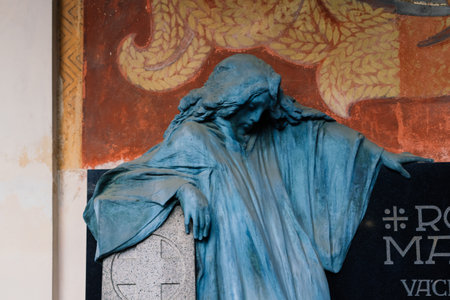 Bratislava, Slovakia - 11.29.2021. Cemetery statues, a despairing woman statue, crosses, resting place graveyard sculpture, artのeditorial素材