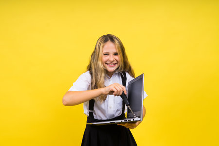 Funny little blonde kid girl 12-13 years old studio portrait. Childhood lifestyle concept.の写真素材