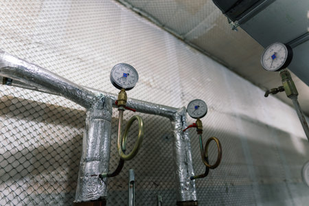 Pressure sensor in an industrial boiler room. Barometer in the heating system. Close-up.