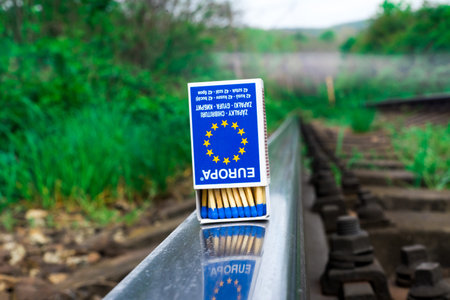 Matches on rails railroad tracks background, fire on railways conceptの写真素材