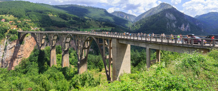 TARA RIVER CANYON, MONTENEGRO - AUGUST 10, 2014: Panoramic view of the bridge of Dzhurdzhevich over the Tara River Canyonのeditorial素材