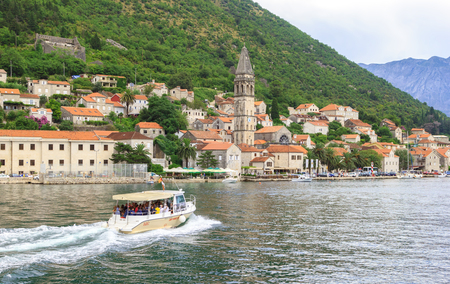 PERAST, MONTENEGRO - AUGUST 6, 2014: View of Perast city from sea side. Perast is town on coast of Montenegro and located on the Bay of Kotorのeditorial素材