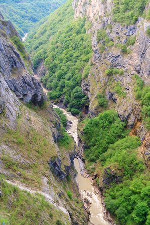 Very sheer canyon in Kabardino-Balkaria in springの写真素材