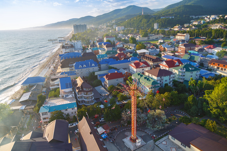 LAZAREVSKOE, SOCHI, KRASNODAR REGION, JULY 5, 2017: View of the beach and park of Lazarevskoe city, Sochi at sunsetのeditorial素材