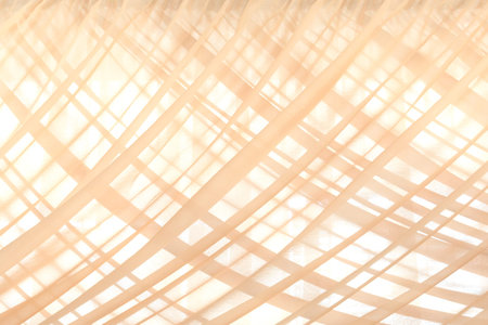 Pattern of beige fabric curtains as the background