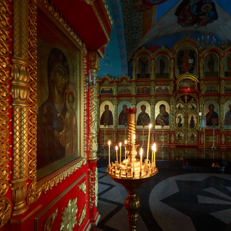 ASTRAKHAN, RUSSIA, 23 OCTOBER 2017: The Great Icon and lighted candles inside of the Assumption Cathedral on the territory of the Astrakhan Kremlinのeditorial素材